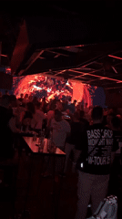 Late night scenes captured in Sofia: nightclub crowds, historical sculpture