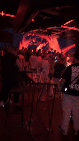 Late night scenes captured in Sofia: nightclub crowds, historical sculpture