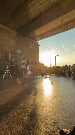 Family enjoys evening outing at Perm embankment with music, art