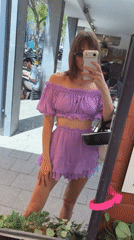 Woman documents shopping trip through Carmel Market selfies