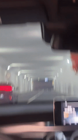 Car drives through lit tunnel in South Jakarta