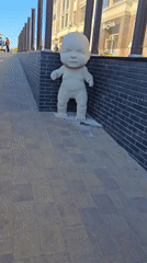 Food festival draws crowds near baby sculpture installation in Zelenogradsk