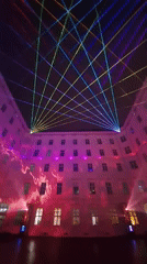 Vienna building features colorful light display with cloud projections