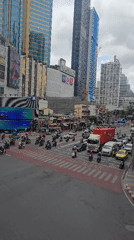 Heavy morning traffic at a central Bangkok intersection near Terminal 21
