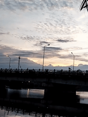 Twilight Bridge Scenes Documented Across Lhokseumawe Waterways