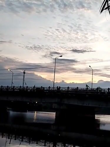 Twilight Bridge Scenes Documented Across Lhokseumawe Waterways