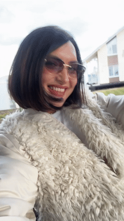 Woman enjoys spring afternoon swinging and dancing in Sarapul