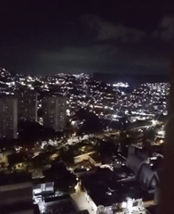 Evening scenes captured in Caracas: cityscape and sewing