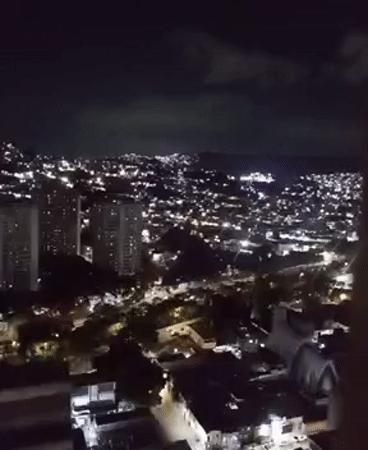 Evening scenes captured in Caracas: cityscape and sewing
