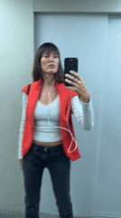 Outfit selfie session across a Moscow building, July 2026