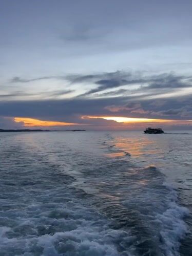 Sunset observed over water in Pattaya with dramatic skies