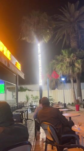 Coffee shop exterior captured at night in Safi, Morocco