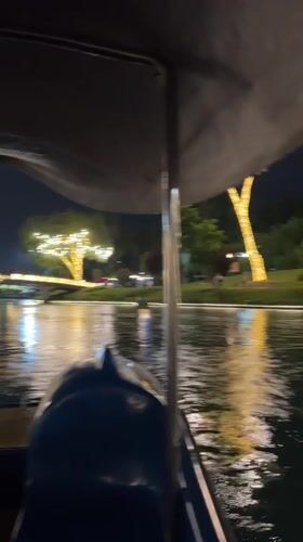 Nighttime paddle boat ride captured on Tashkent lake