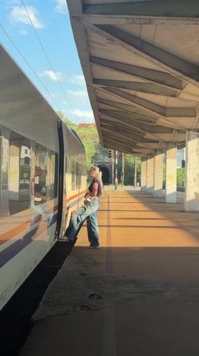 Travelers board train at Mostar station Friday afternoon