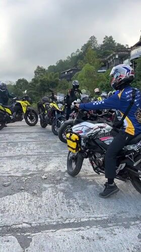 Motorcycle group gathers at scenic Kintamani mountain overlook
