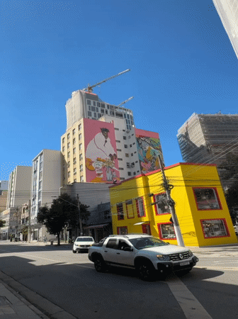 Psychedelic street murals covering São Paulo building facades