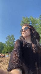 Sunny day camping and water activities in Noviy, Russia