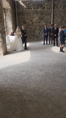 Outdoor wedding celebration features mariachi band performance at rustic venue