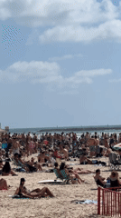 Busy beach day captured in Tel Aviv