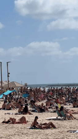 Busy beach day captured in Tel Aviv
