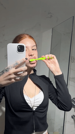 Woman records herself brushing teeth in Buenos Aires bathroom