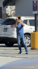 Late-night trombone performance in North Vancouver parking lot