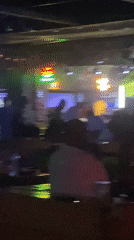Evening social gathering at Howayi nightclub with drinks and dining