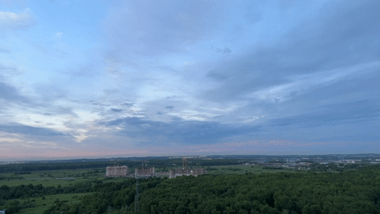 Elevated landscape views captured across Russian region during evening hours