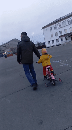 Casual moments captured in Yurgamysh: father-child walk, woman's selfie