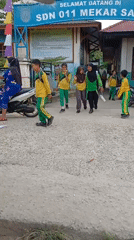 After-school scene outside Dumai City primary schools