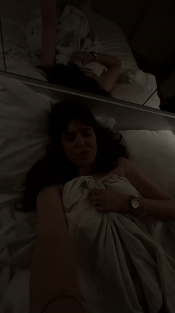 Woman photographed in bed in Batumi, Georgia