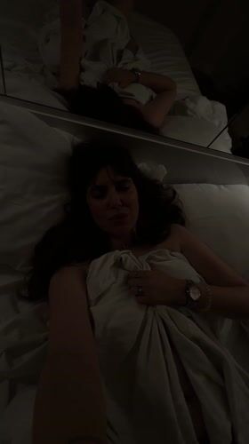Woman photographed in bed in Batumi, Georgia