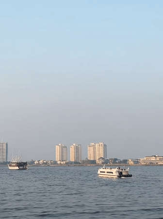 Jet ski crew works the docks at a North Jakarta waterfront