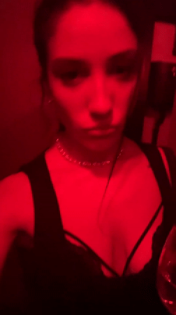 Woman documents night out at red-lit Buenos Aires nightclub