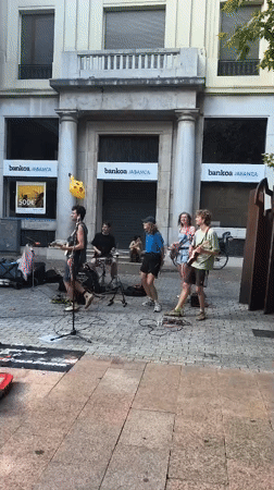Street band plays outside a bank in Vitoria-Gasteiz