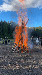 Bonfire gathering in the woods near Soanlakhti, Russia