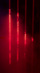 Red-lit bars with blue flashes captured in smoky Moscow space
