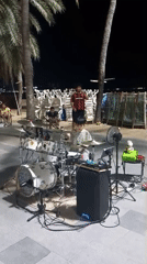 Night market activity and street performances documented in Pattaya