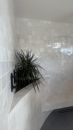 Woman with book spotted on Palm Springs sidewalk