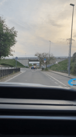 Routine traffic movement captured at Alcolea roundabout during evening commute