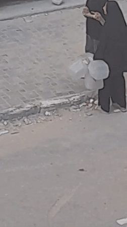 Water distribution and daily street life in Khan Yunis