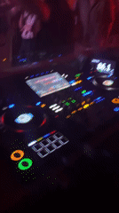Helmeted DJ performs at Barcelona club venue