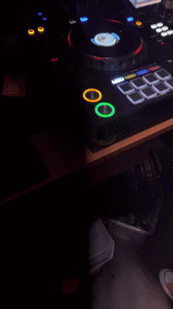 Helmeted DJ performs at Barcelona club venue