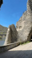 Tourist explores dramatic cliff formations in Asparuhovo, Bulgaria