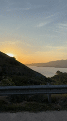 Sunset captured over water from road in Indonesia