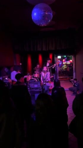 Early morning live band performance documented in Buenos Aires