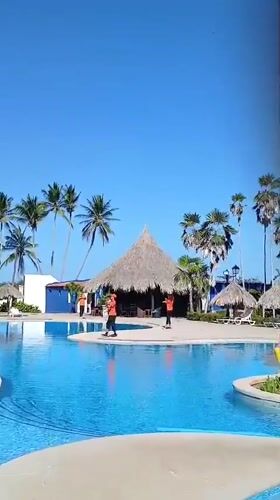 Resort staff maintain facilities, entertain guests at Venezuelan beach resort
