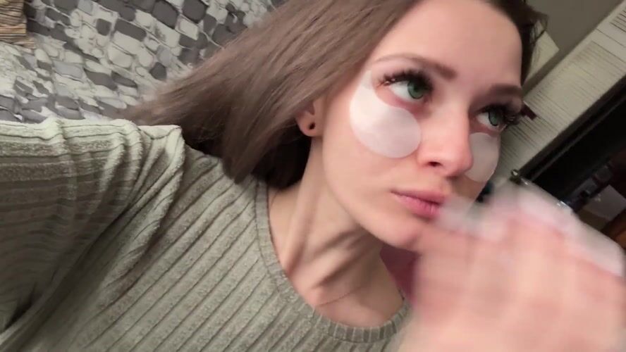 Woman applies skincare patches in gaming chair, Reutov