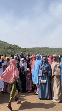 Community gathering in traditional dress observed in Naraguta Hausawa