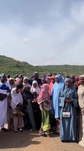 Community gathering in traditional dress observed in Naraguta Hausawa